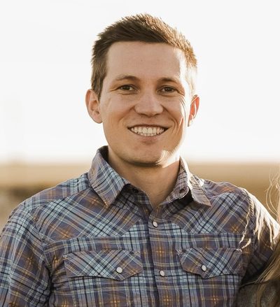 Justin Smith, General Manager of Adventure Idaho, photographed outdoors in Idaho.